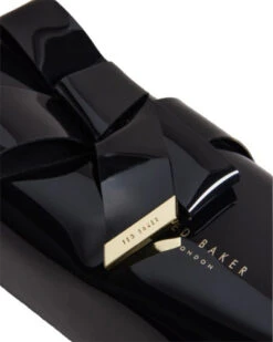 Ted Baker Nikara Penaali / Meikkipussi Musta -Laukkuni meikkipussi ted baker rusetti penaali nikara